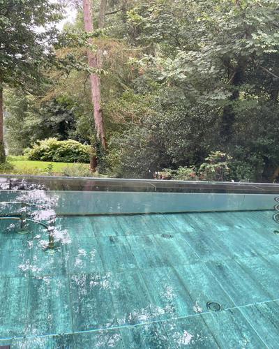 Outdoor Swimming Pool with a River View